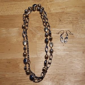 Silver and gold necklace and earrings